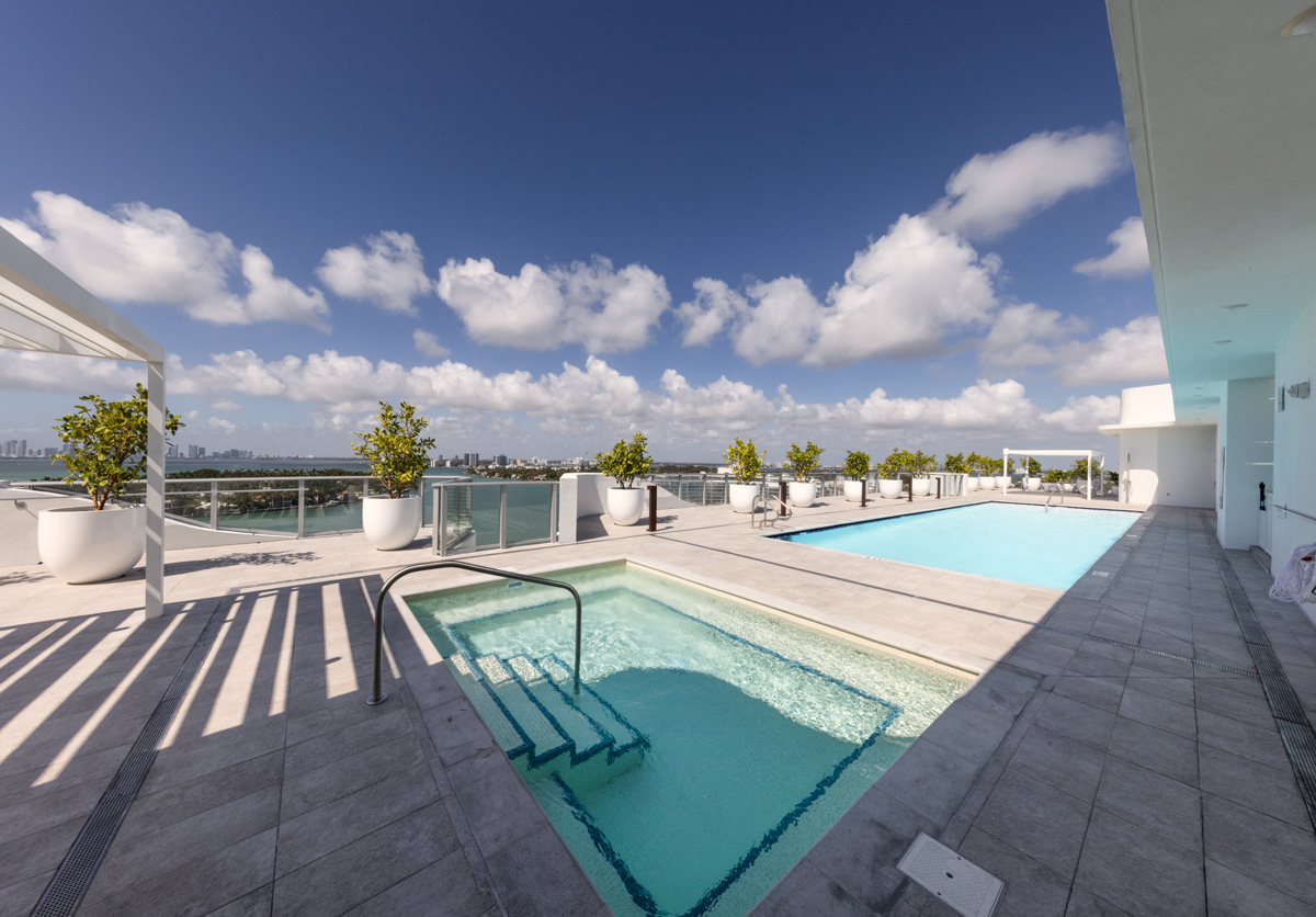 Architectural pool view at Monaco Yacht Club condo in Miami Beach, FL.