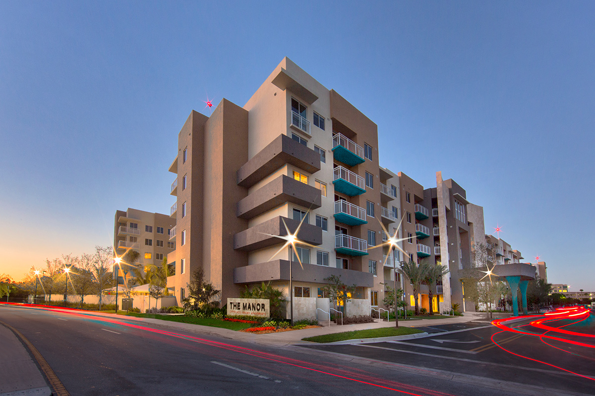 Architectural dusk view of The Manor Lauderdale by the Sea Rentals - Fort Lauderdale, FL 