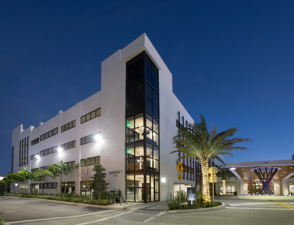 Dusk entrance and garage view of the Sanctuary Doral FL Luxury Rental.