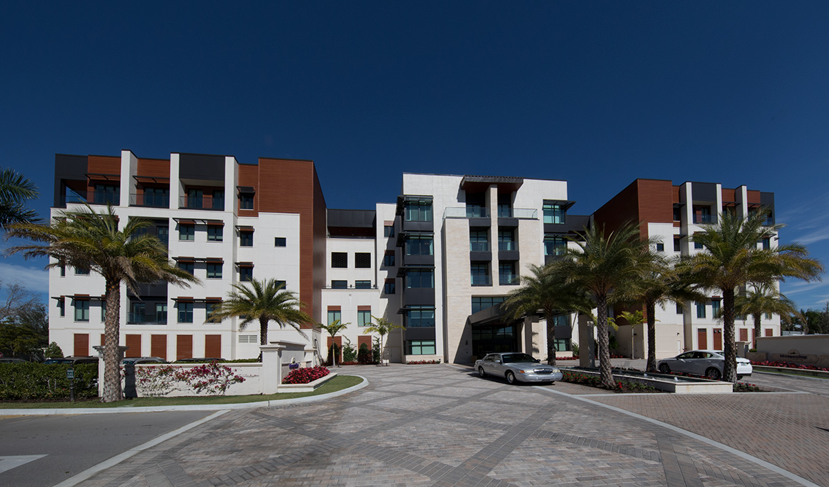 Architectural view of Moorings Park at Grey Oaks senior living in Naples, FL.