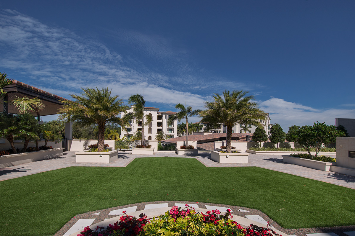 Architectural view of Moorings Park at Grey Oaks senior living in Naples, FL.