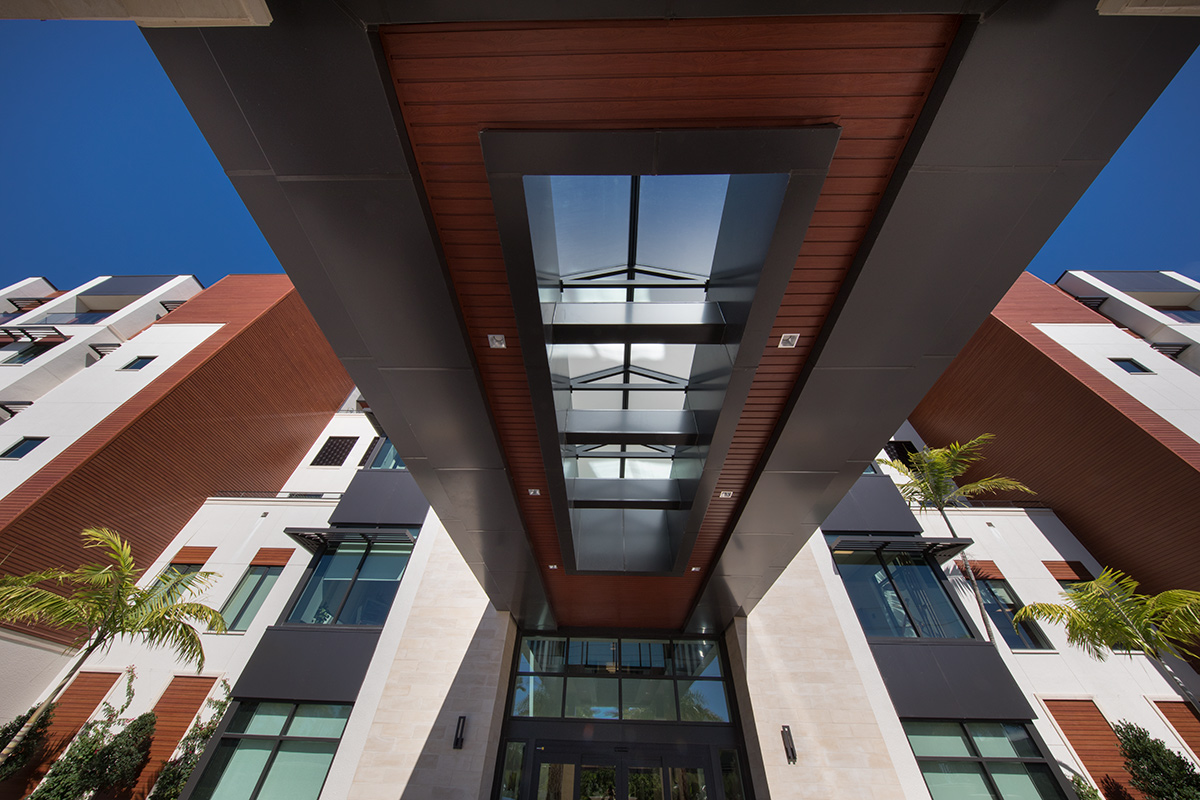 Architectural view of Moorings Park at Grey Oaks senior living in Naples, FL.