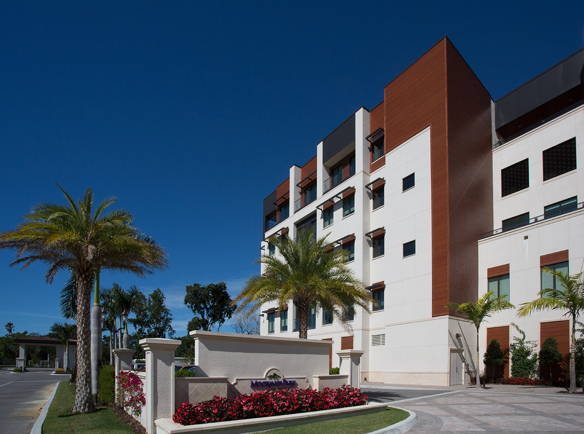 Architectural view of Moorings Park at Grey Oaks senior living in Naples, FL.