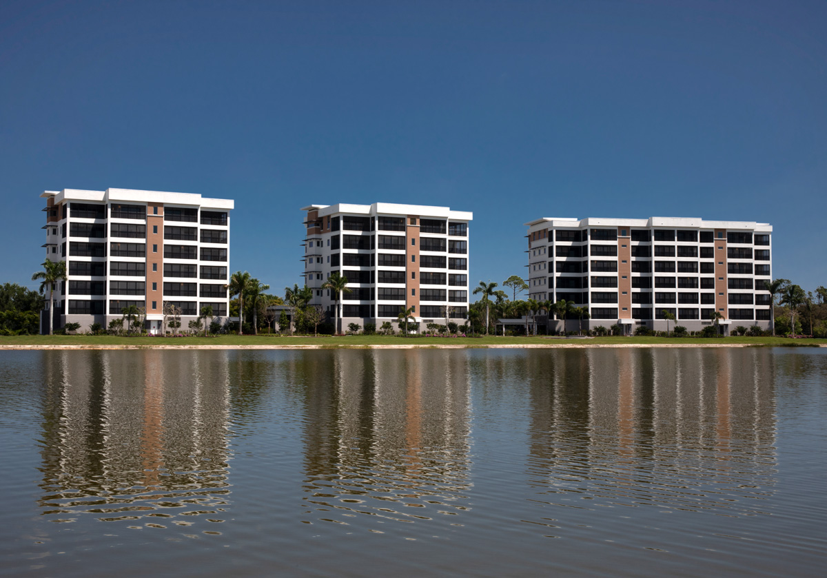 Architectural water view of Moorings Park Grande Lake Senior Living in Naples, FL