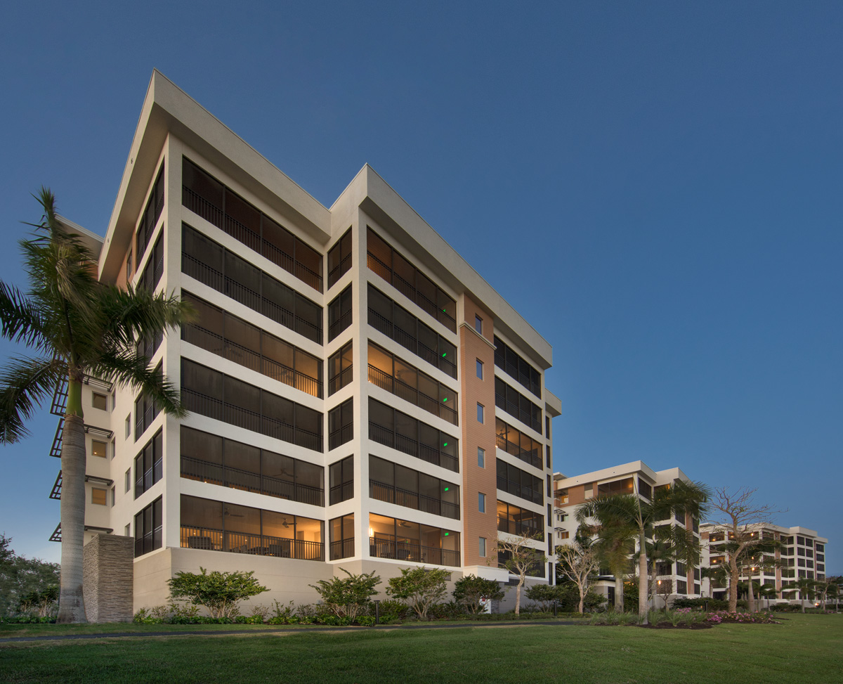 Architectural dusk view of Moorings Park Grande Lake Senior Living in Naples, FL