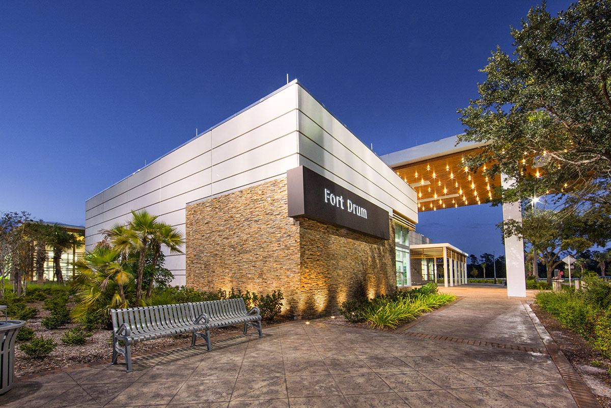 Architectural dusk view of the Fort Drum Service Plaza - Okeechobee, FL