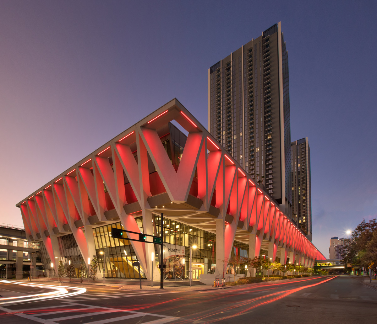 Architectural dusk view of the Brightline Miami Central terminal.