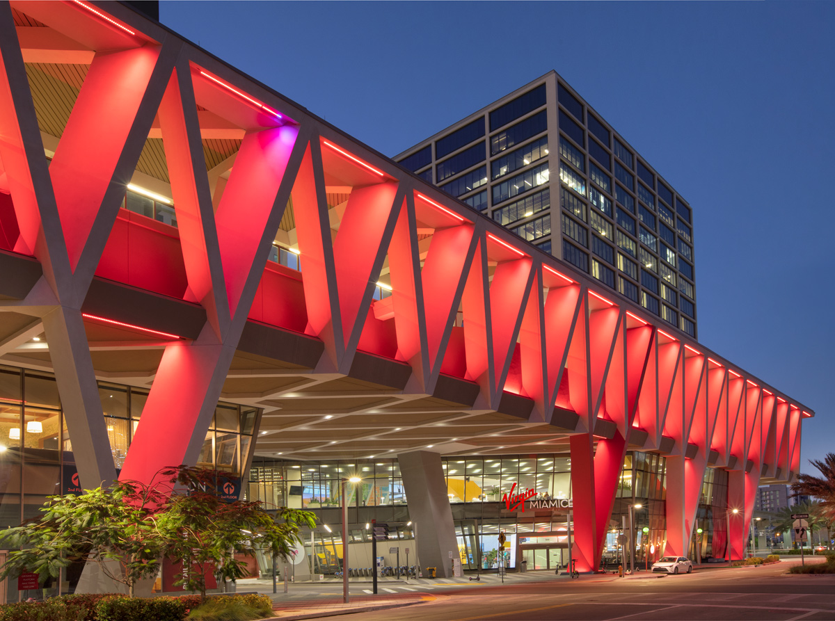 Architectural dusk view of the Brightline Miami Central terminal  entrance.