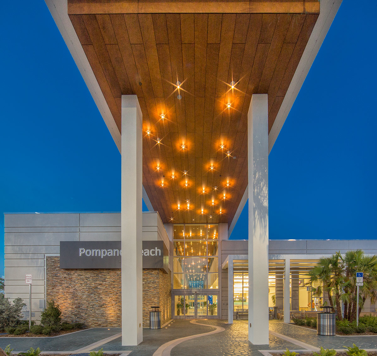 Architectural dusk view of the Pompano Beach FL Service Plaza.