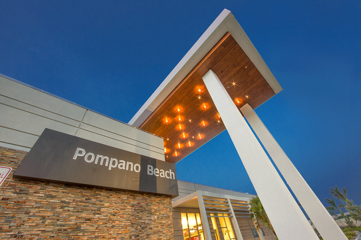 Architectural dusk view of the Pompano Beach FL Service Plaza.
