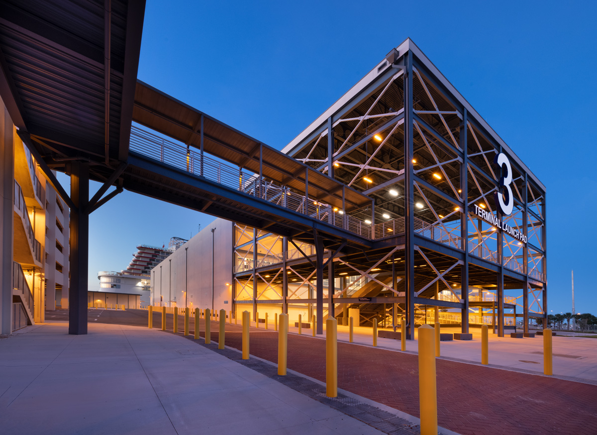 Architectural dusk view of Port Canaveral Terminal 3  launch pad entrance with connecting bridge.