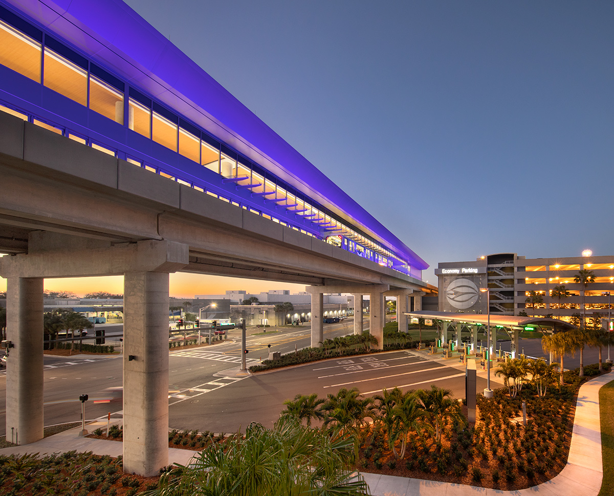 Architectural dusk view of the people mover at the Tampa Int airport.