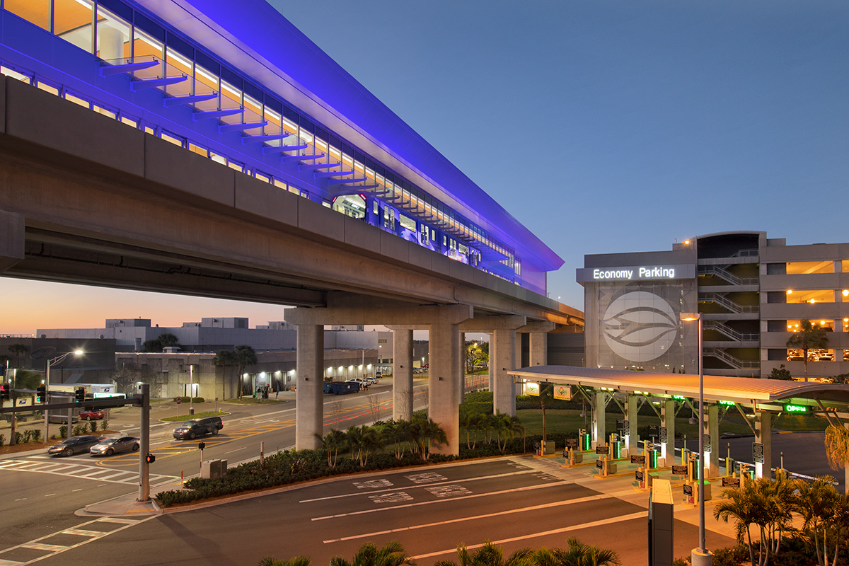 Architectural dusk view of the people mover at the Tampa Int airport.